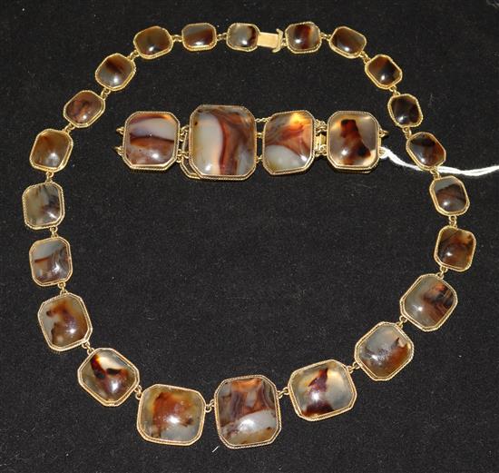 A gilt metal mounted agate necklace and matching bracelet, necklace 18in.